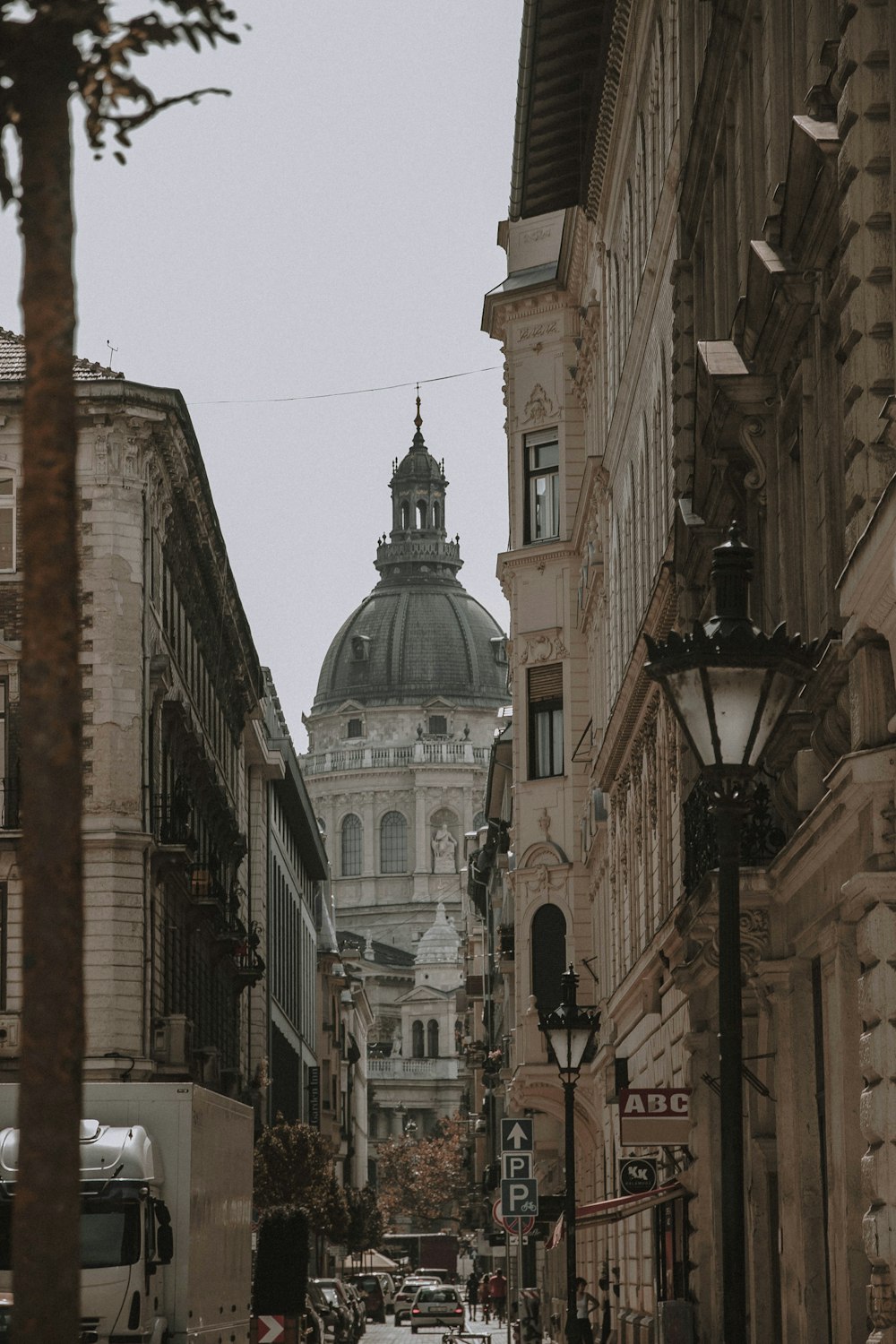 a city street with a church in the background