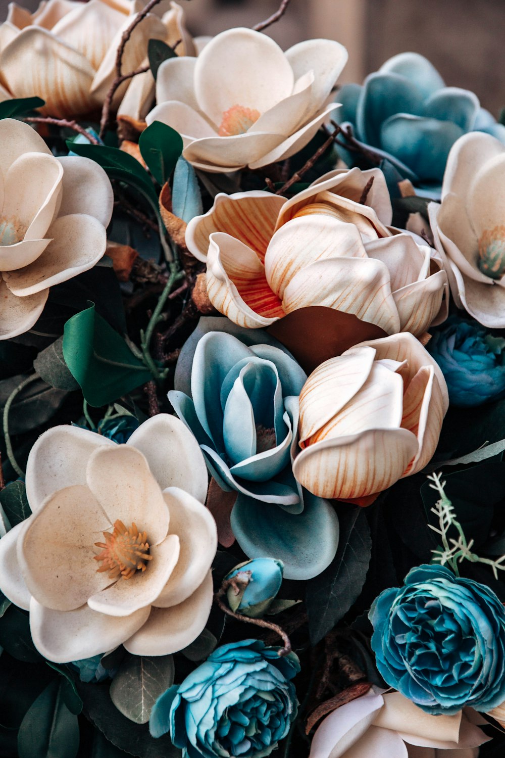 a bunch of flowers that are sitting on a table