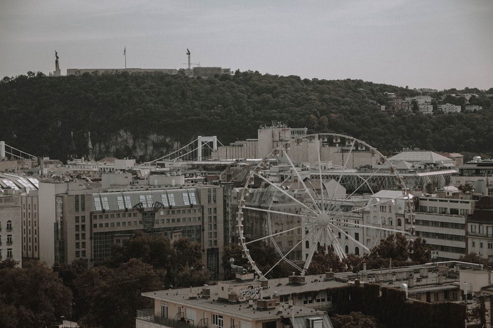 a ferris wheel in the middle of a city