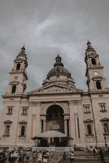 A vibrant photo of visitors admiring the stunning architecture of the Santuario de Las Lajas.