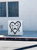 a white box with a heart drawn on it