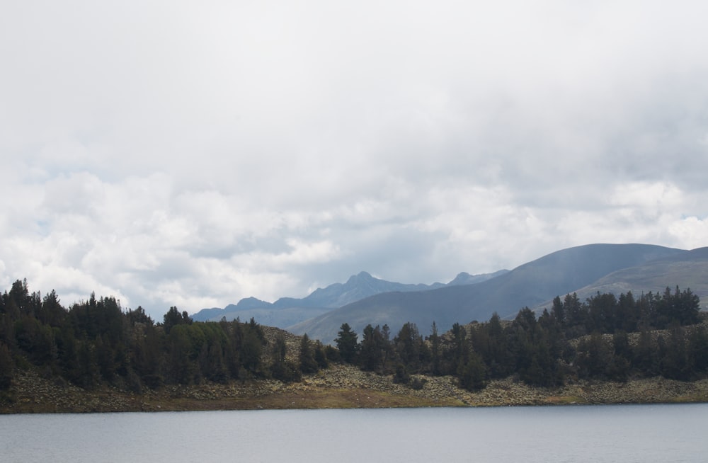 a large body of water surrounded by mountains