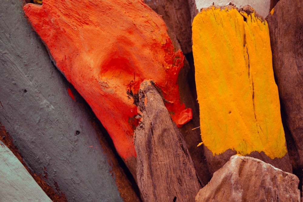a close up of a piece of wood with paint on it