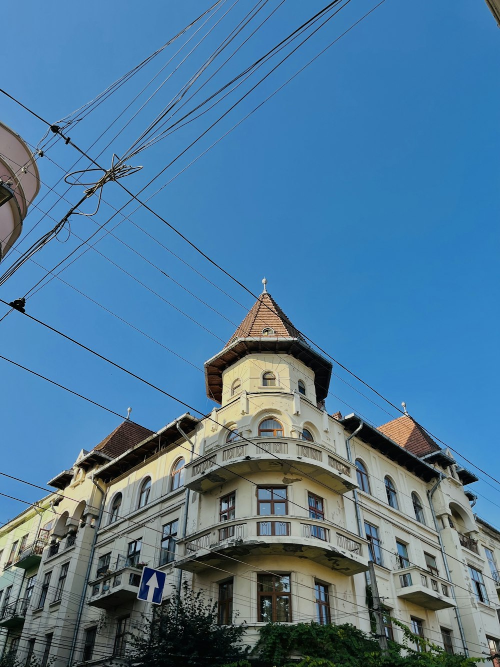 a tall building with a clock on the top of it