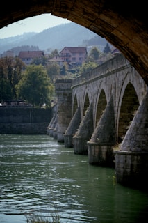a view of a bridge over a body of water