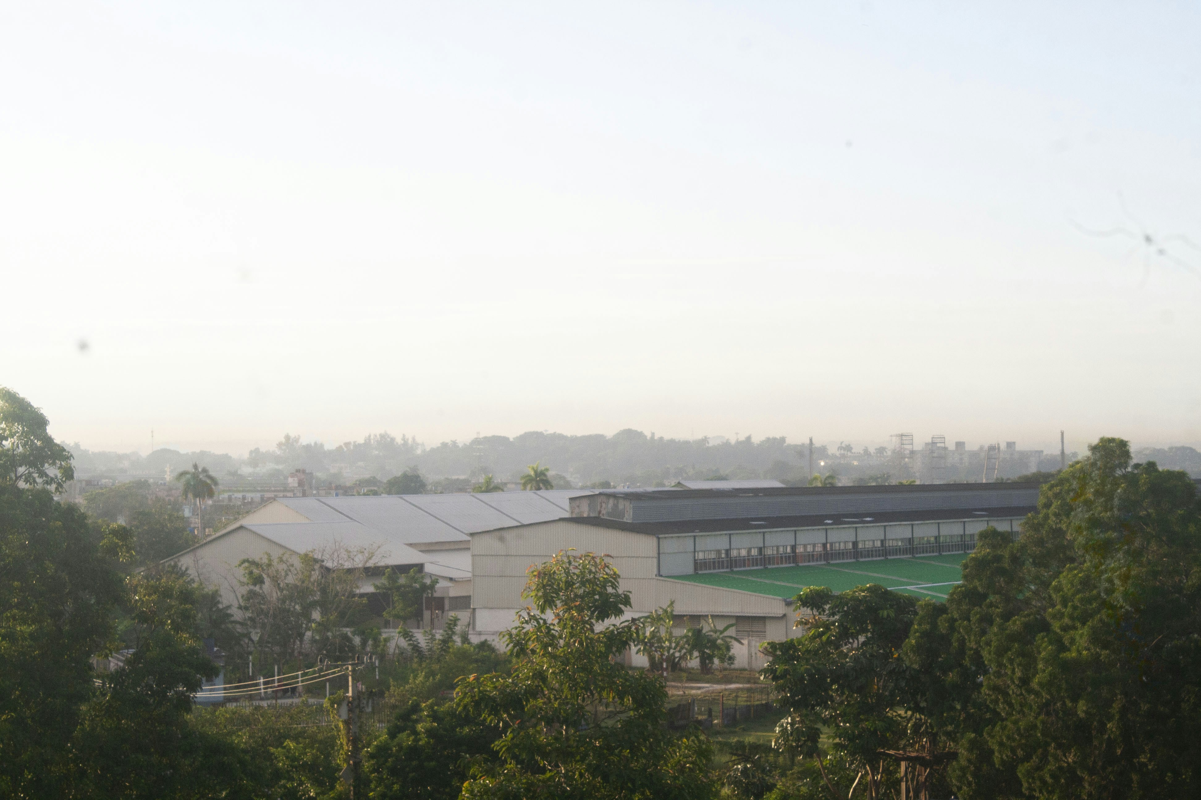 Processing facility with tennis court