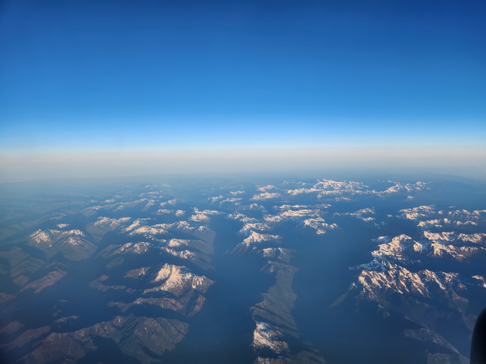 a view of the mountains from an airplane