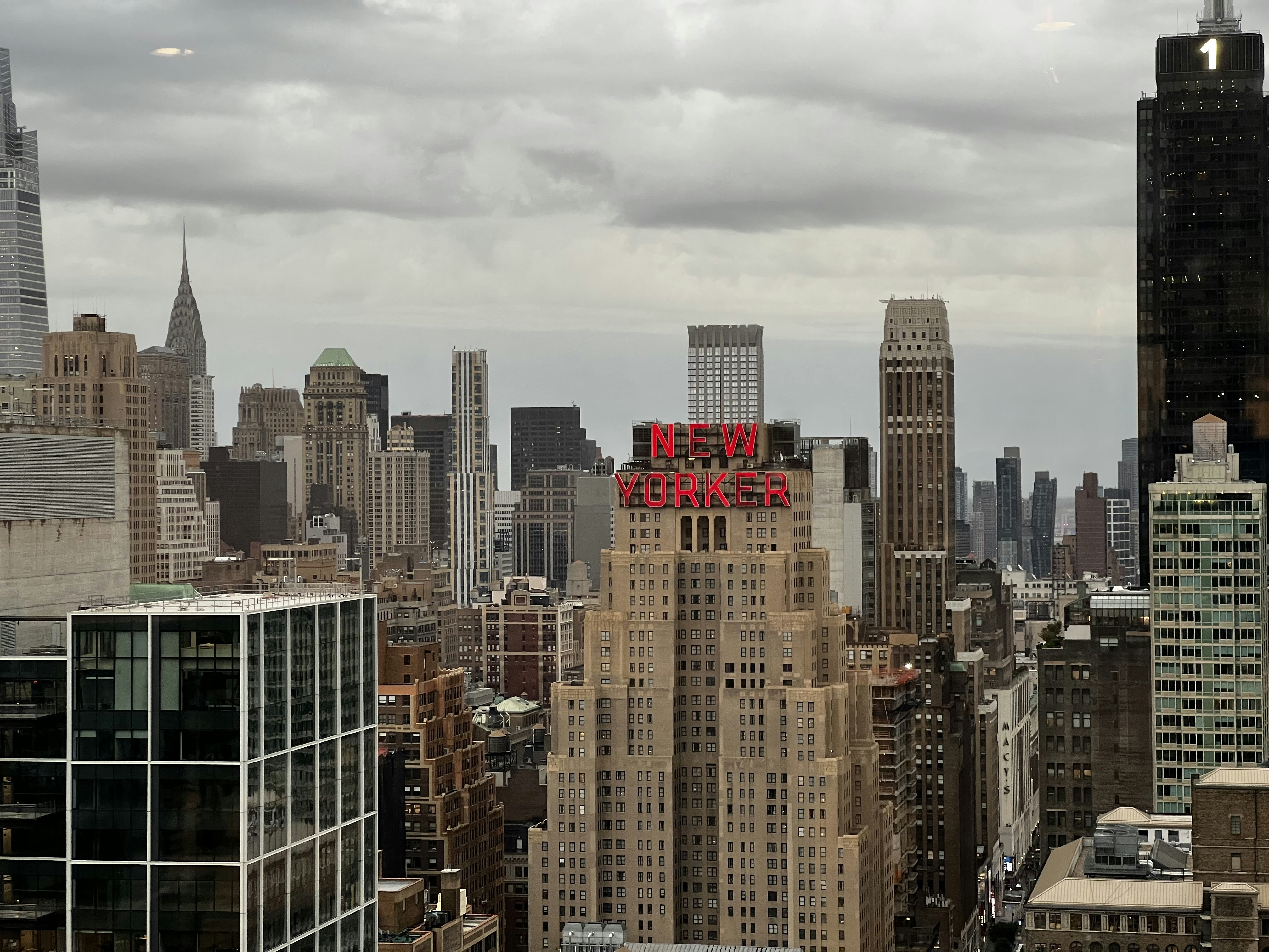 a view of a large city with tall buildings