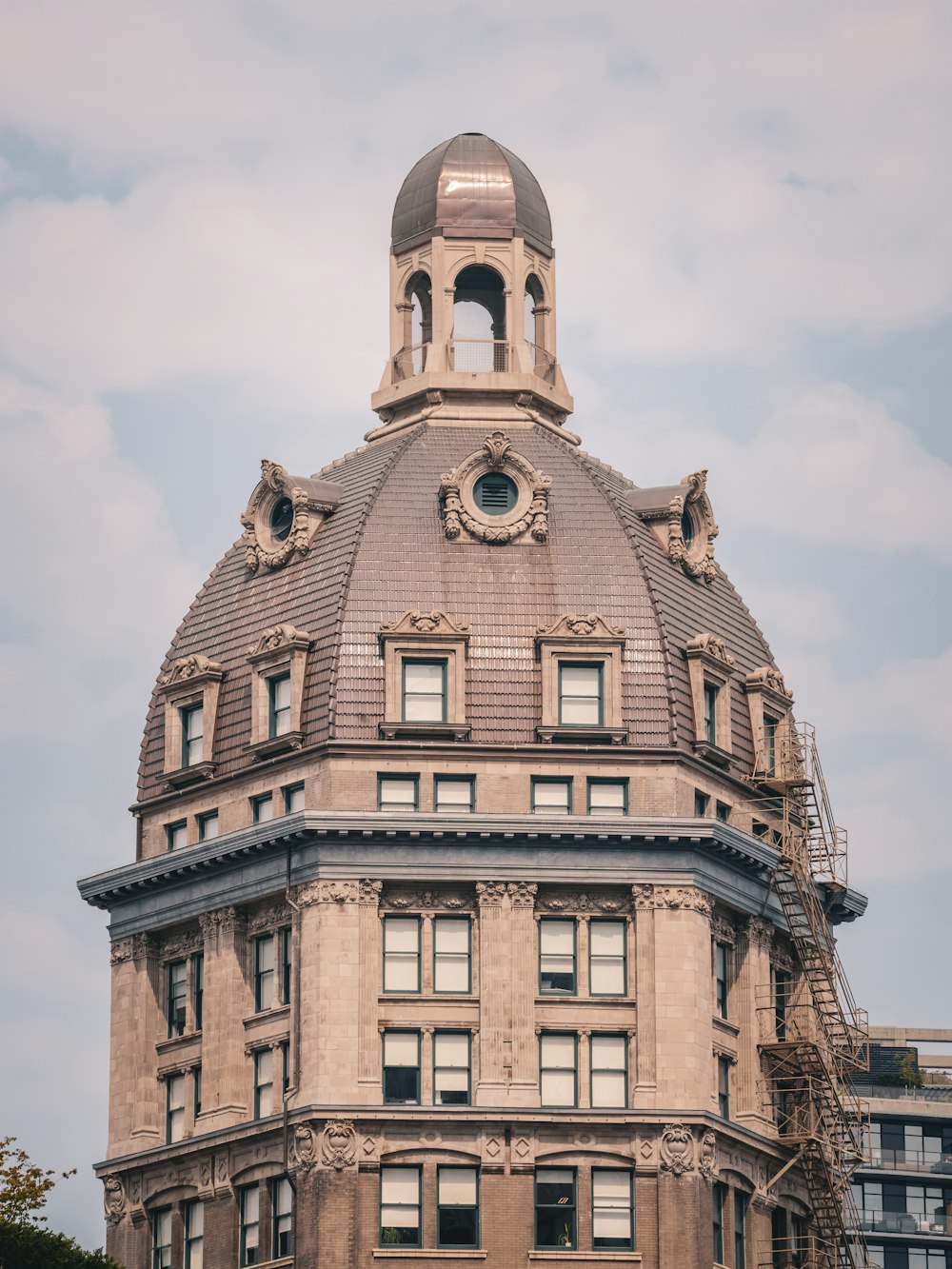 a large building with a clock on the top of it