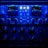 A close-up view of an audio processing panel, featuring various knobs, dials, and buttons. The panel displays intricate details such as compression meters, EQ controls, and frequency adjustments. The lighting casts a deep blue hue over the entire panel, giving it a high-tech, sophisticated appearance.