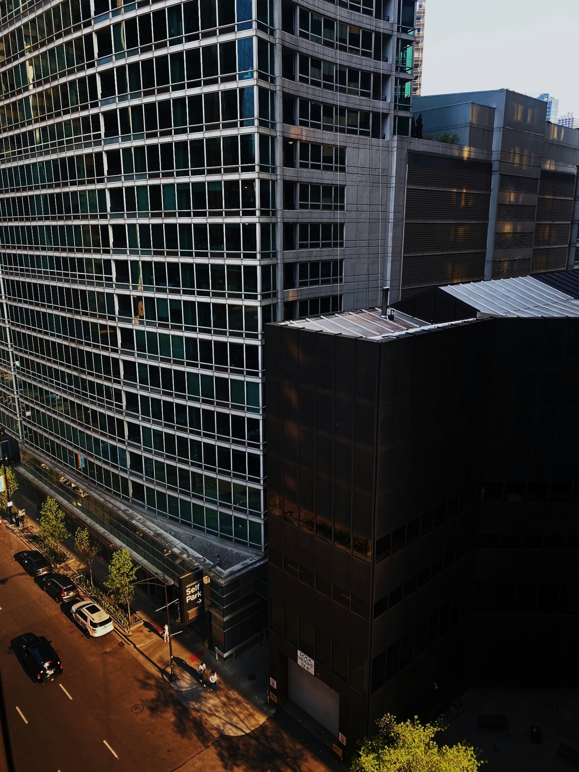 a very tall building sitting next to a very tall building