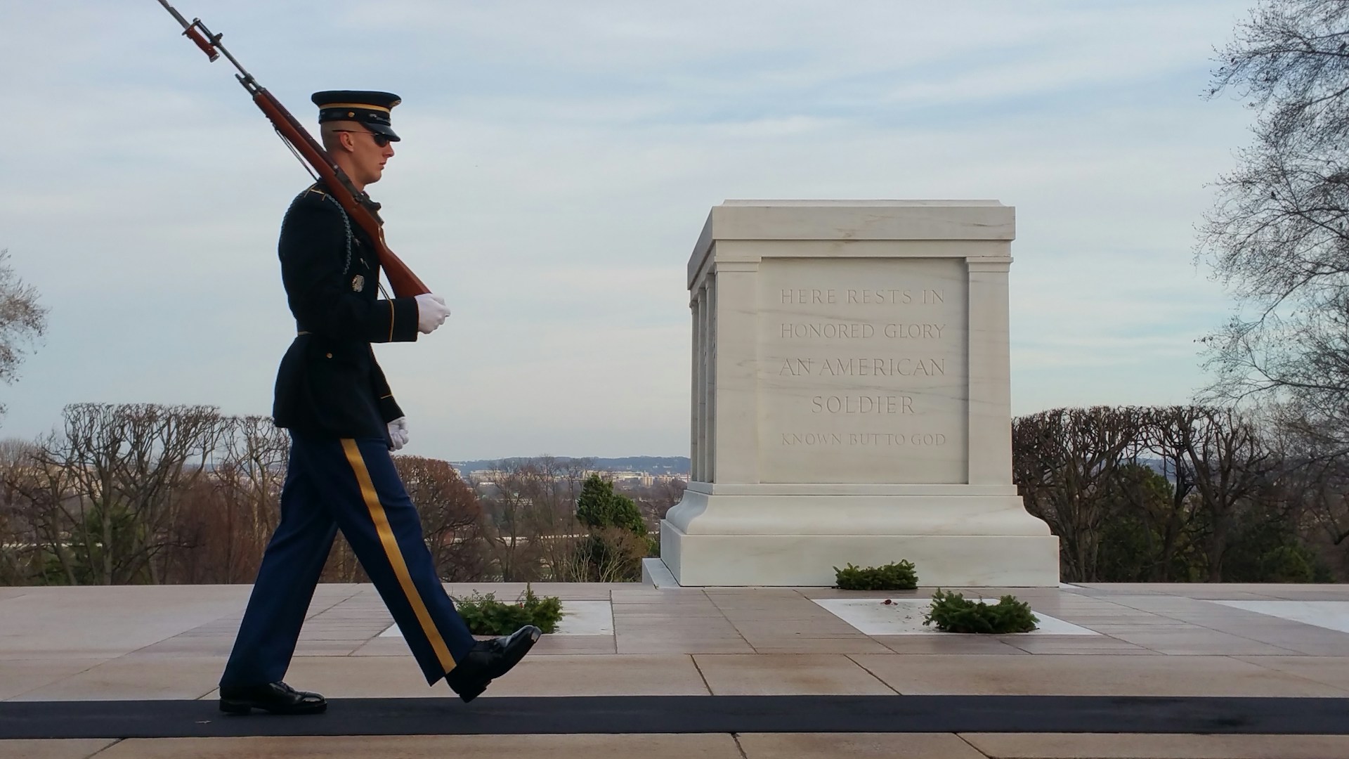 woman wearing yellow long-sleeved dress under white clouds and blue sky during daytime