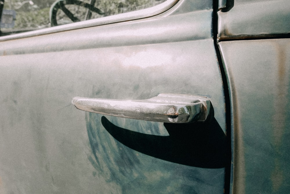 a close up of a door handle on a car