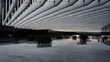 Public architectural space featuring open areas and sleek design.