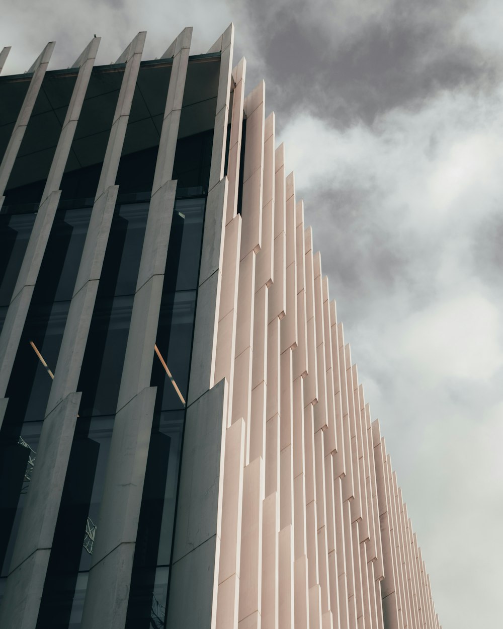 a tall building with a sky in the background