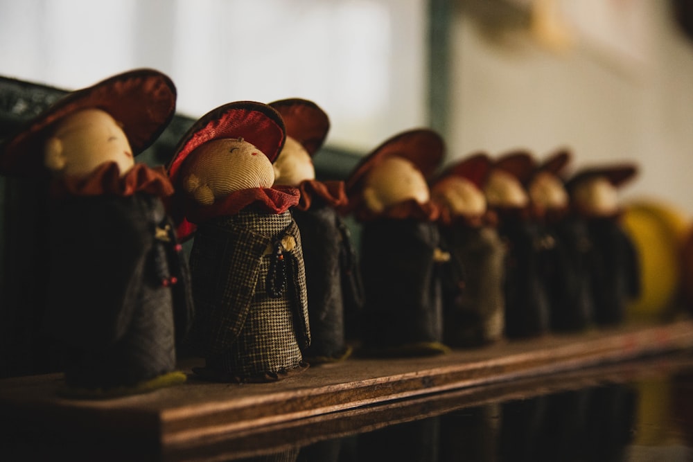 a row of bags filled with mushrooms sitting on top of a table