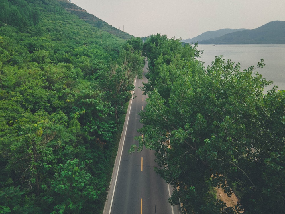 a view of a road and a body of water