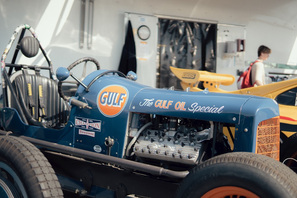 a close up of an old fashioned race car
