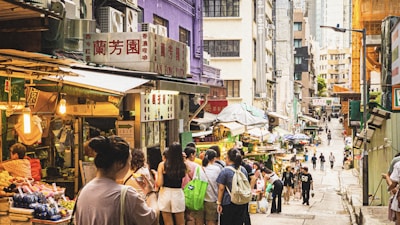 Corporate team exploring a vibrant local market during a cultural tour