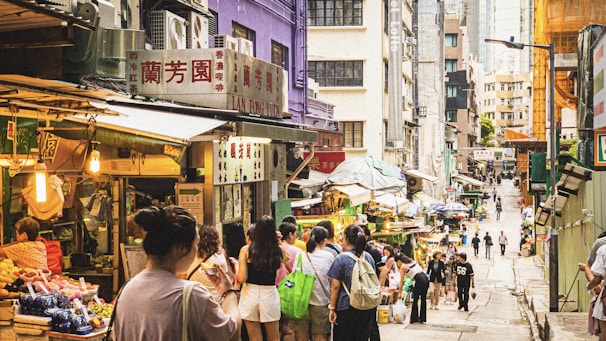 A vibrant street scene capturing daily life in a bustling city market.