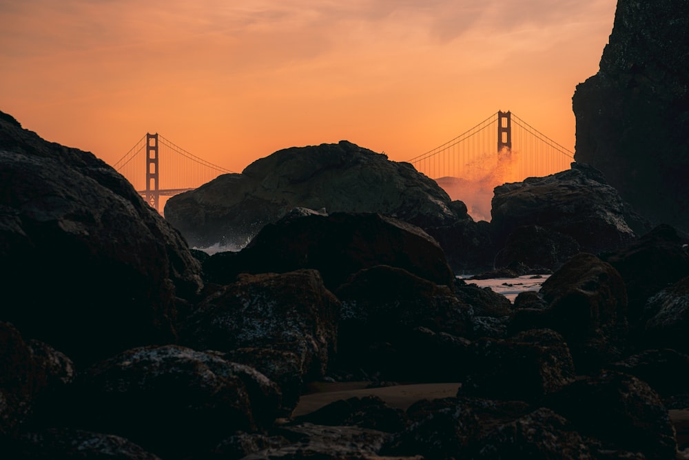 a view of the golden gate bridge at sunset