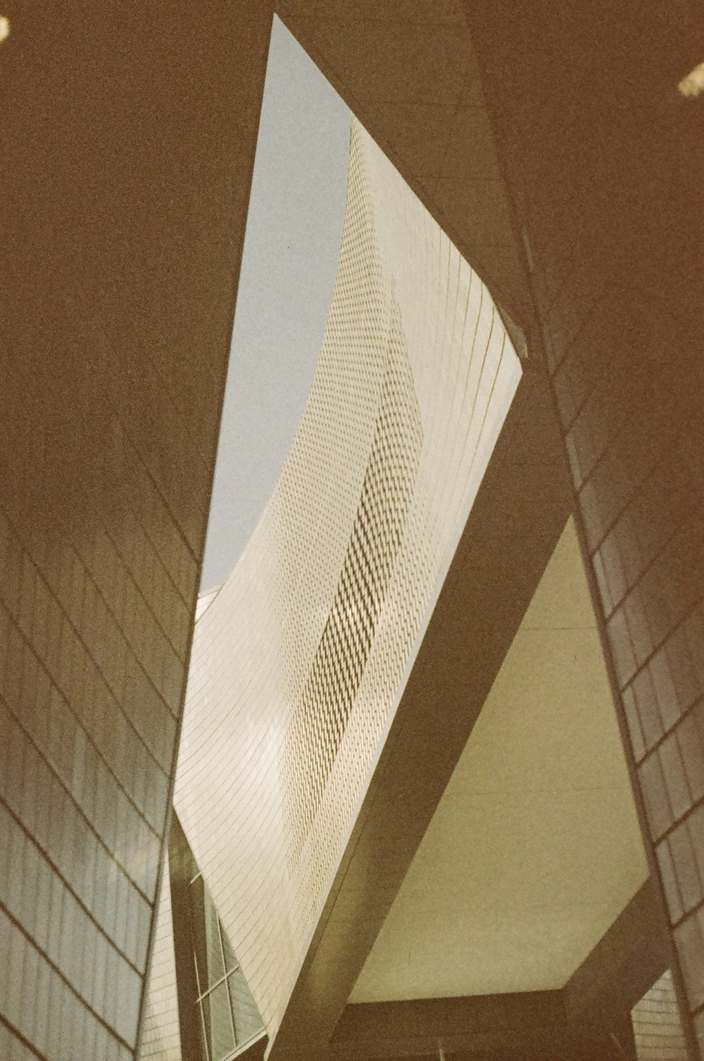 a tall building with a clock on the side of it