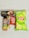 An assortment of packaged snack items including a bottle of mixed fruit juice, a Snickers bar, a Kit Kat bar, a box of Dark Fantasy Choco Fills biscuits, and a package of Lay's American Style Cream & Onion flavored chips. The items are laid out on a plain surface.