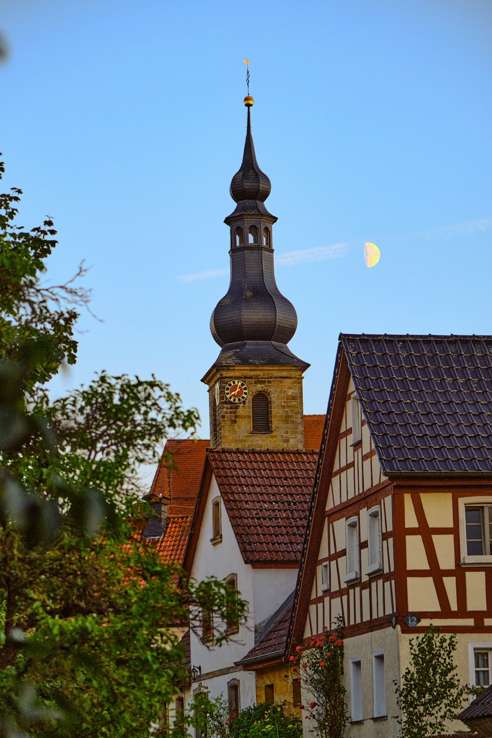 a building with a steeple and a clock tower