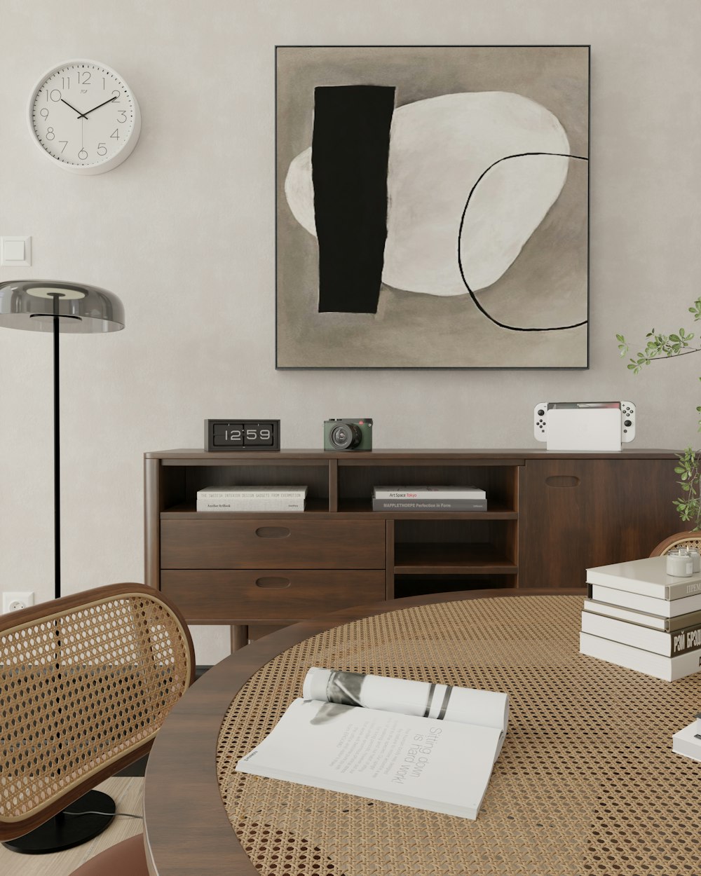 a picture of a table with books and a clock on the wall