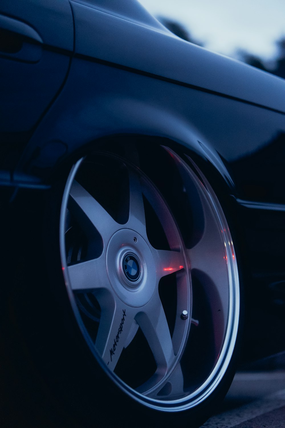 a close up of a tire on a car