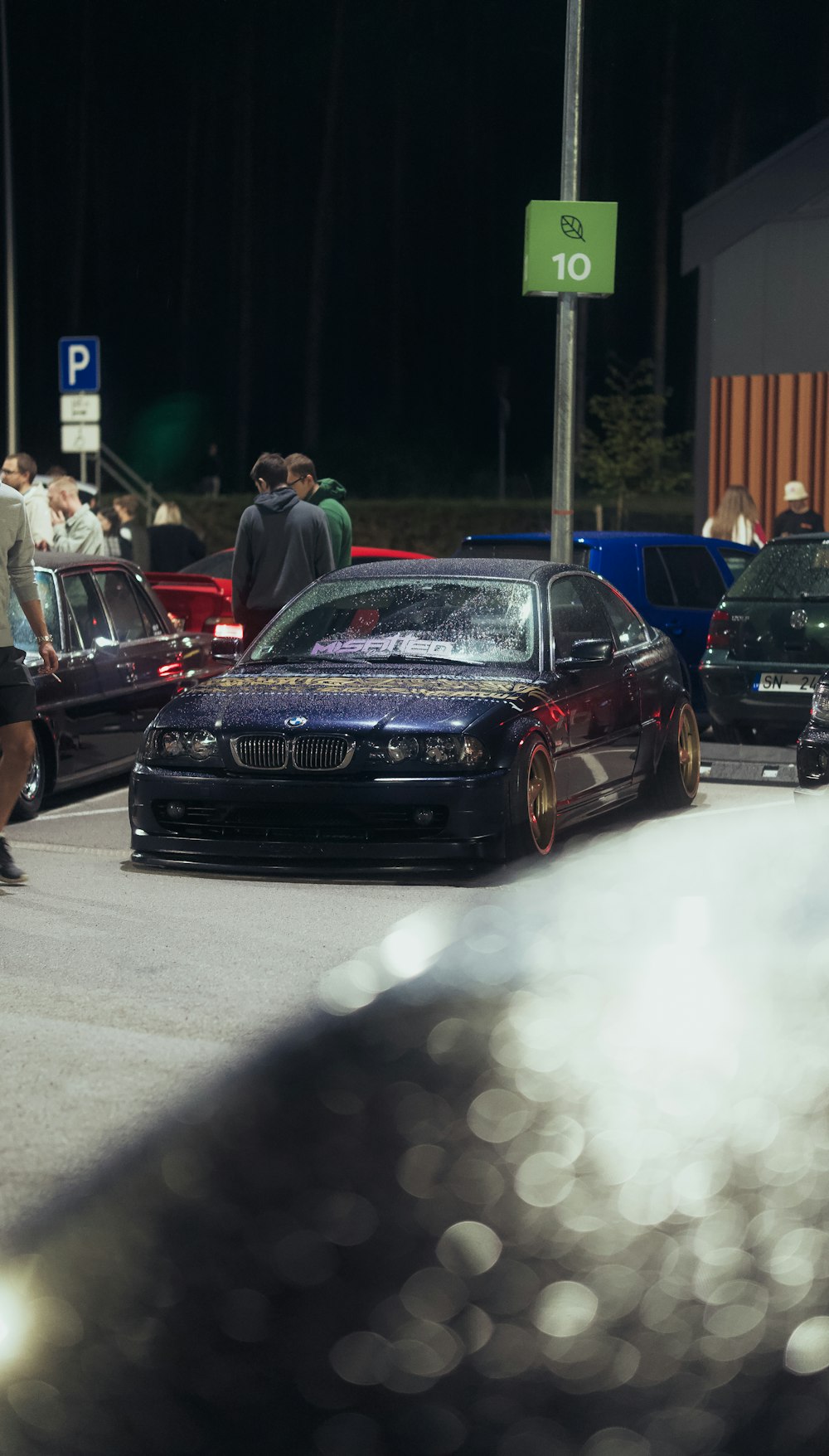 a bunch of cars that are sitting in the street