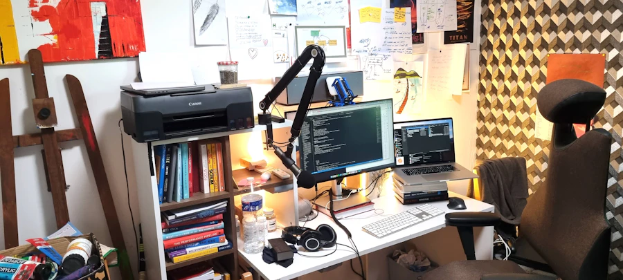 A desk with a laptop and a printer set up side by side