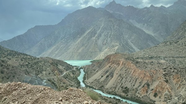 A view of a river and mountains from the top of a hill — Pamir Highway, Tajikistan