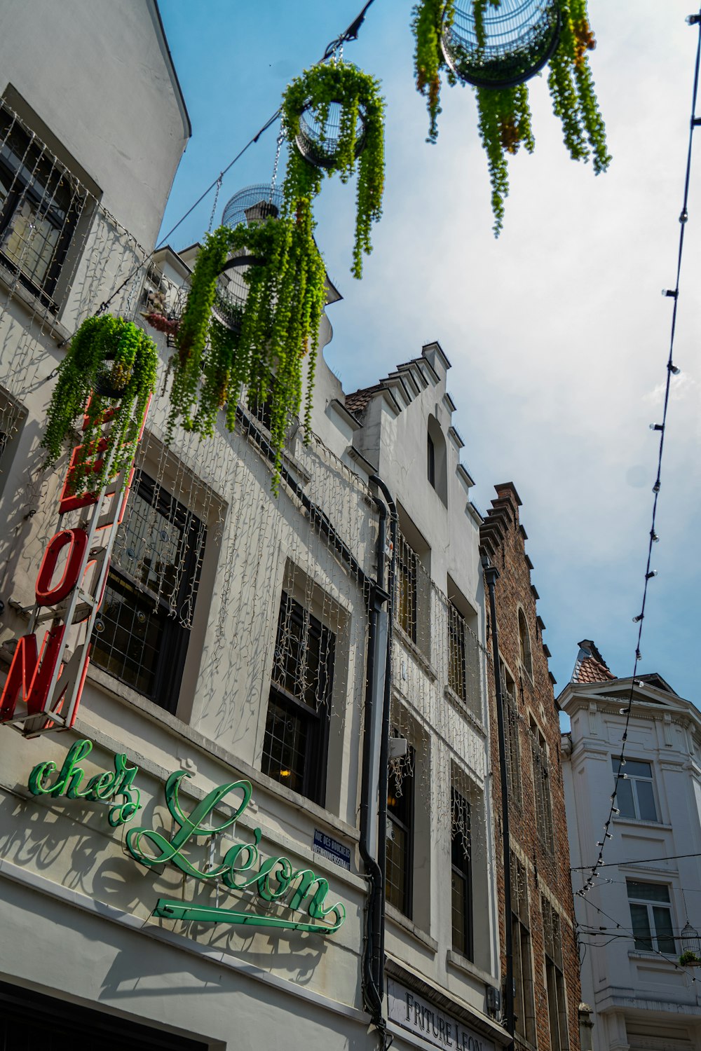 a row of buildings on a city street