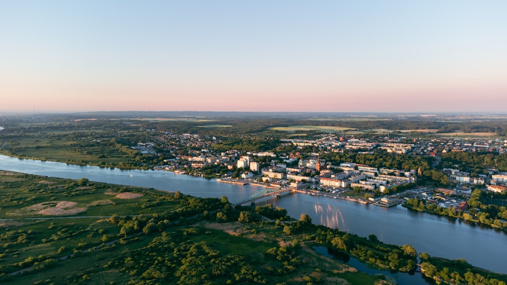 an aerial view of a city and a river