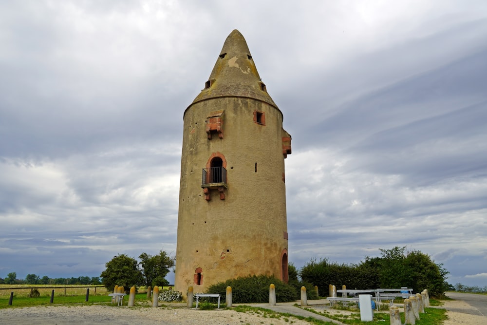 a tall tower with a clock on the top of it