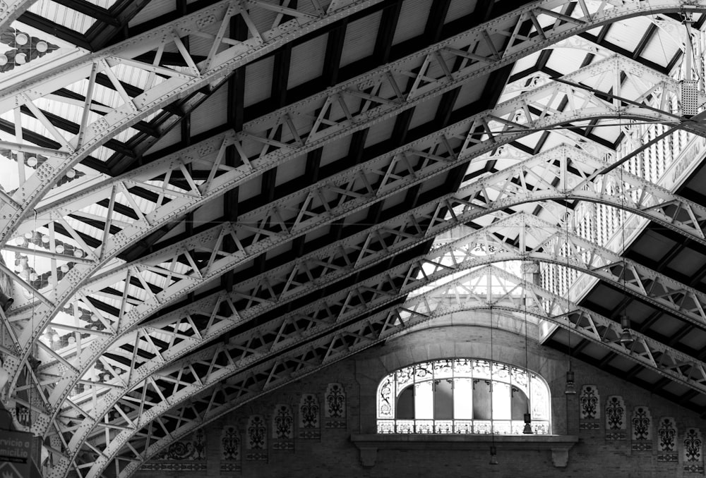 a black and white photo of a train station