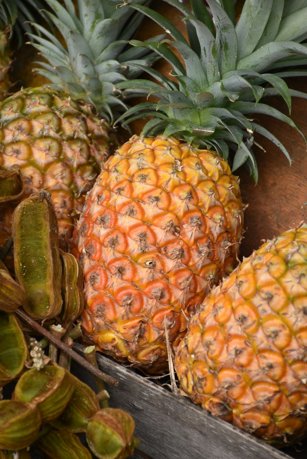a pile of pineapples sitting next to each other