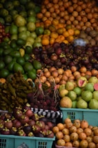 a large display of fruits and vegetables in baskets