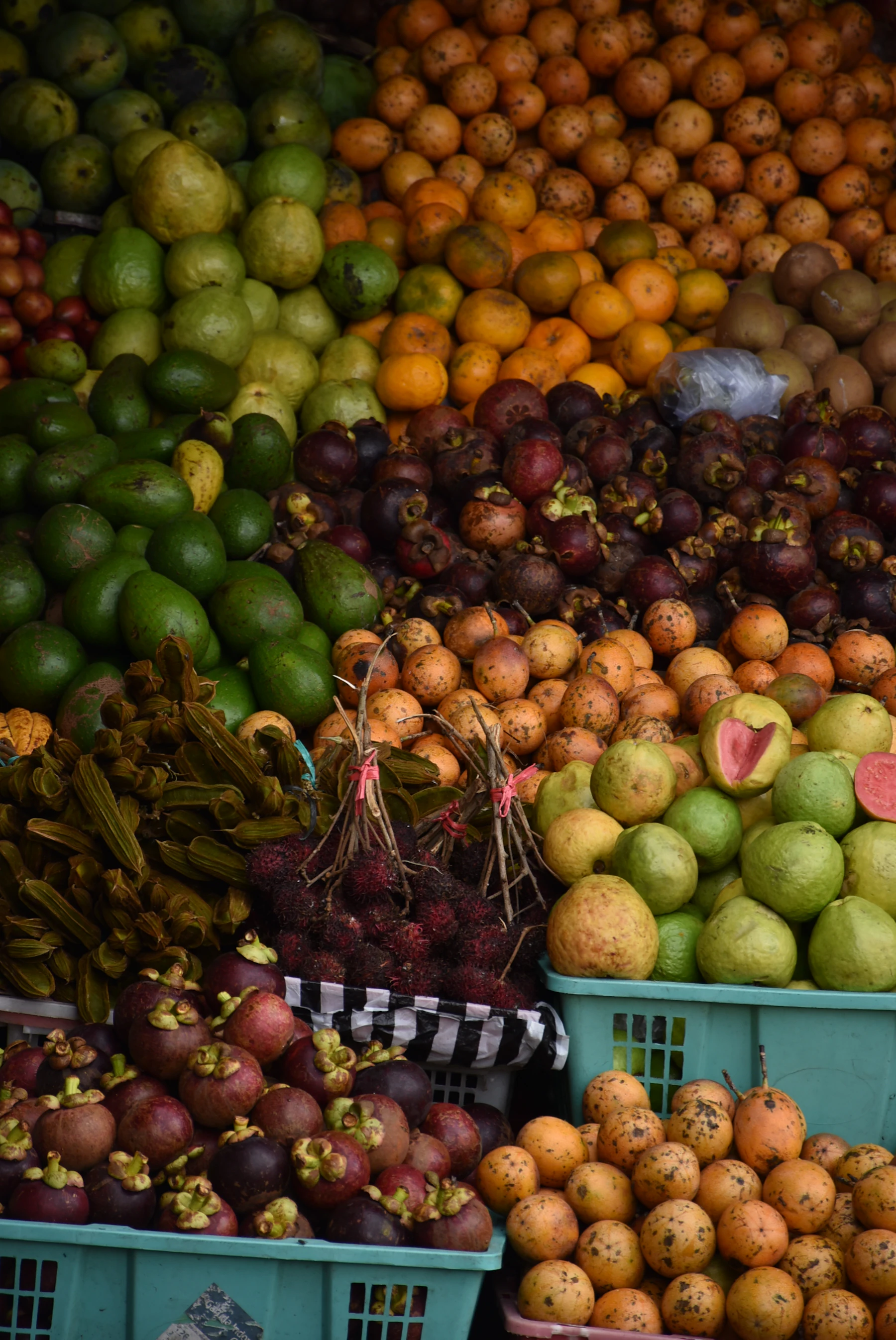 Baskets of fresh Asian produce on display at a market