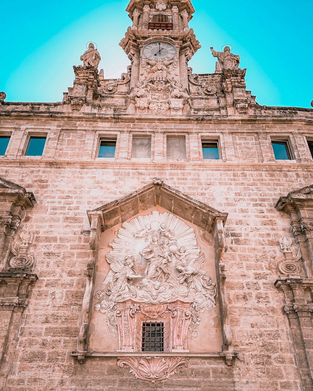 a building with a clock on the side of it