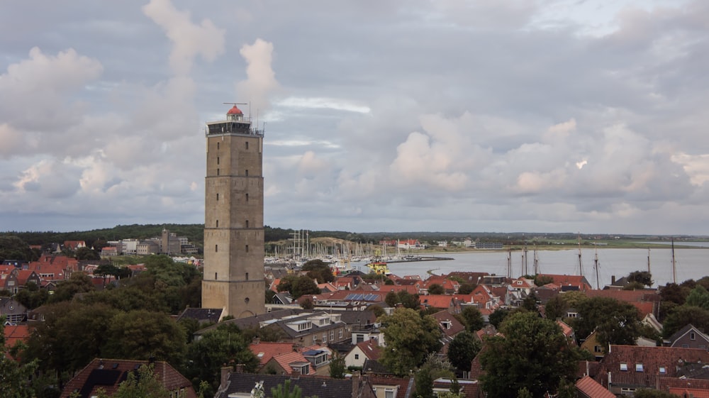 a tall clock tower towering over a city