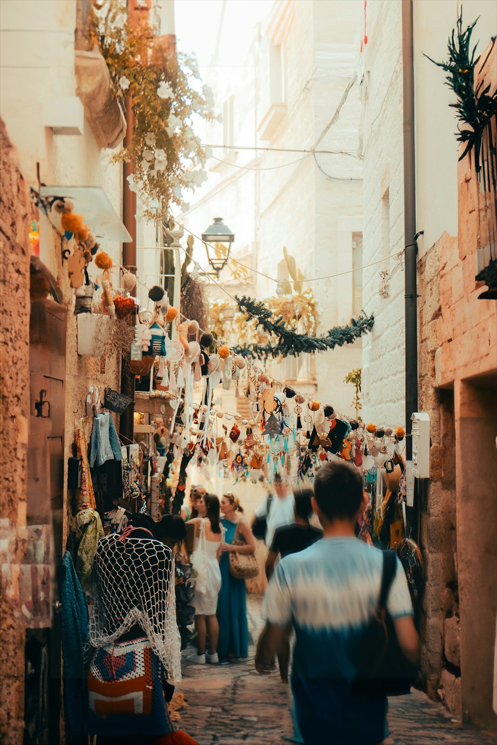 a group of people walking down a street