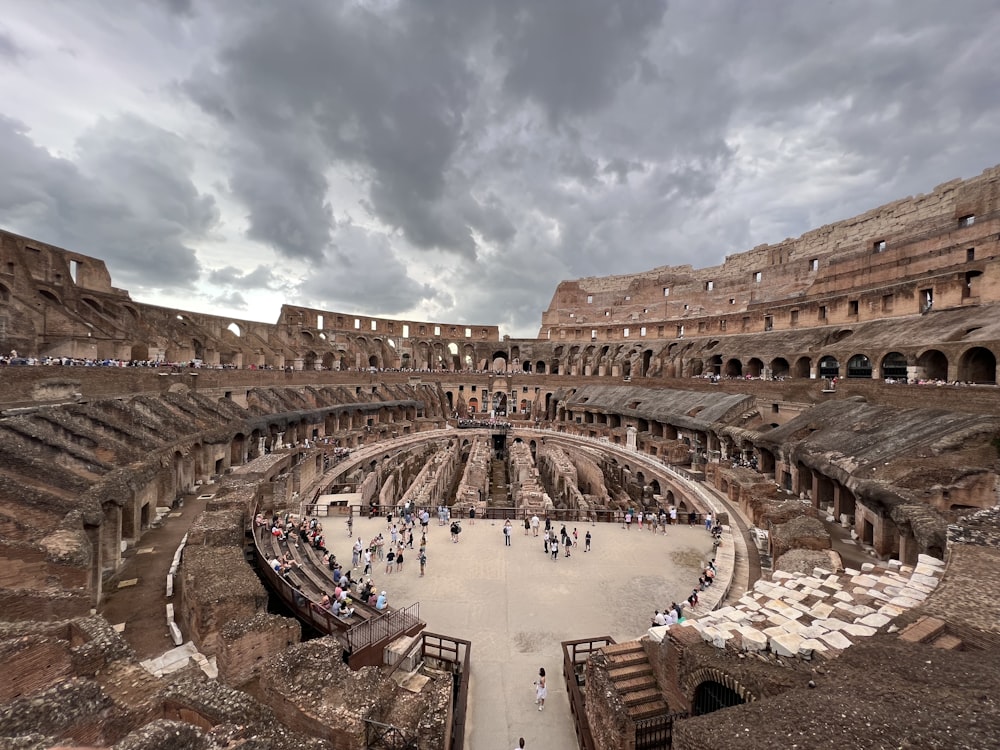 a group of people standing in a large building