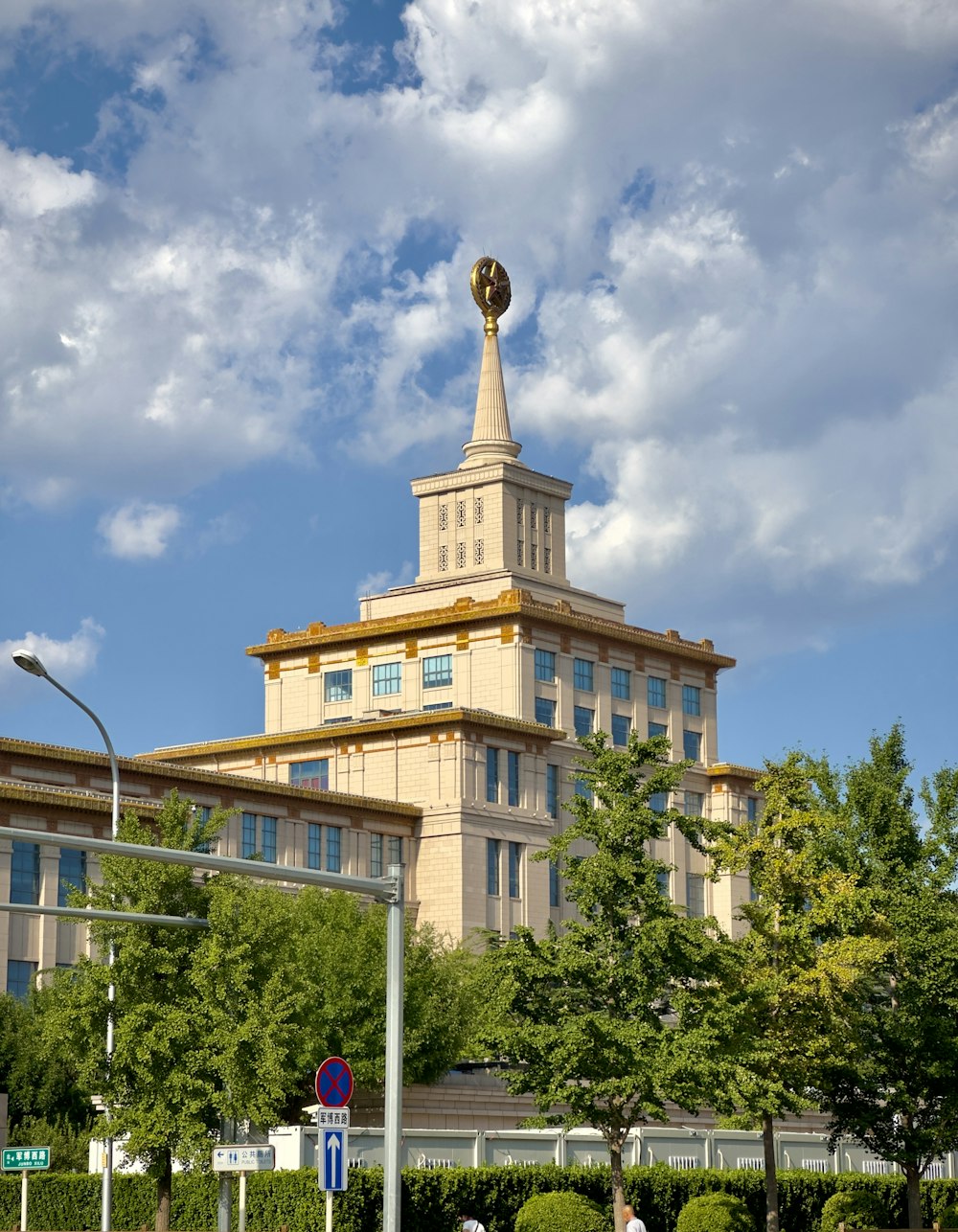 a tall building with a clock on the top of it