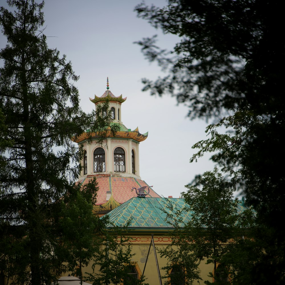 a tall building with a clock on the top of it