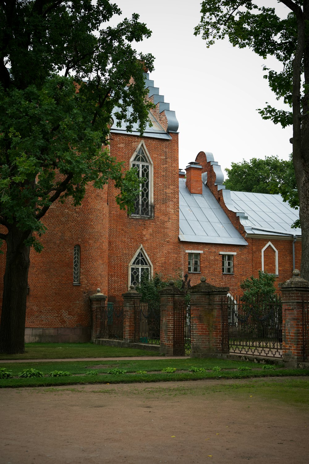 a large brick building with a clock tower