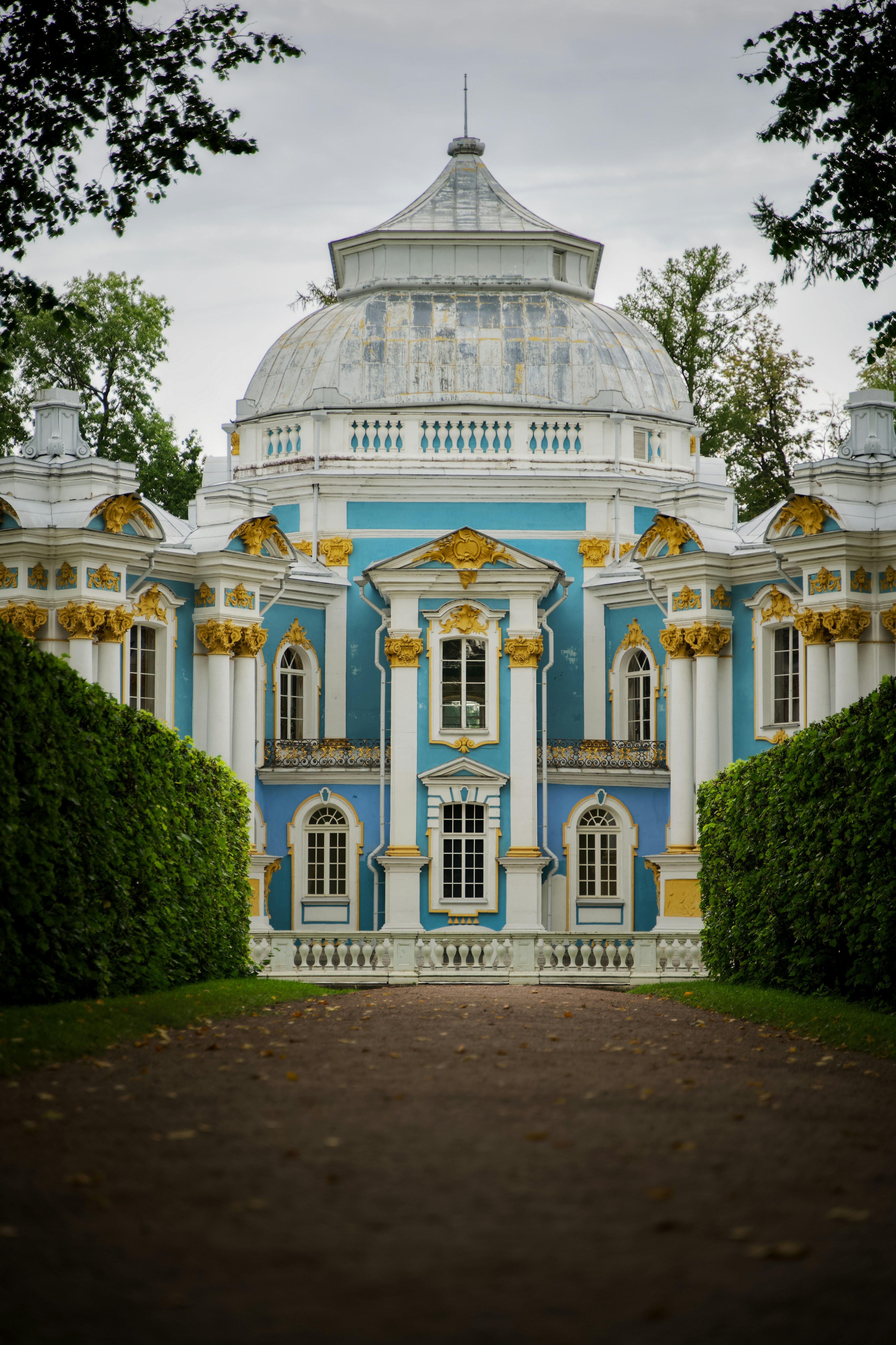 a blue and white building with a white dome