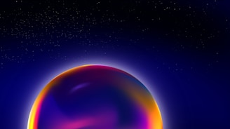 A glowing golden flame surrounded by soft cosmic starfield on a midnight indigo background.