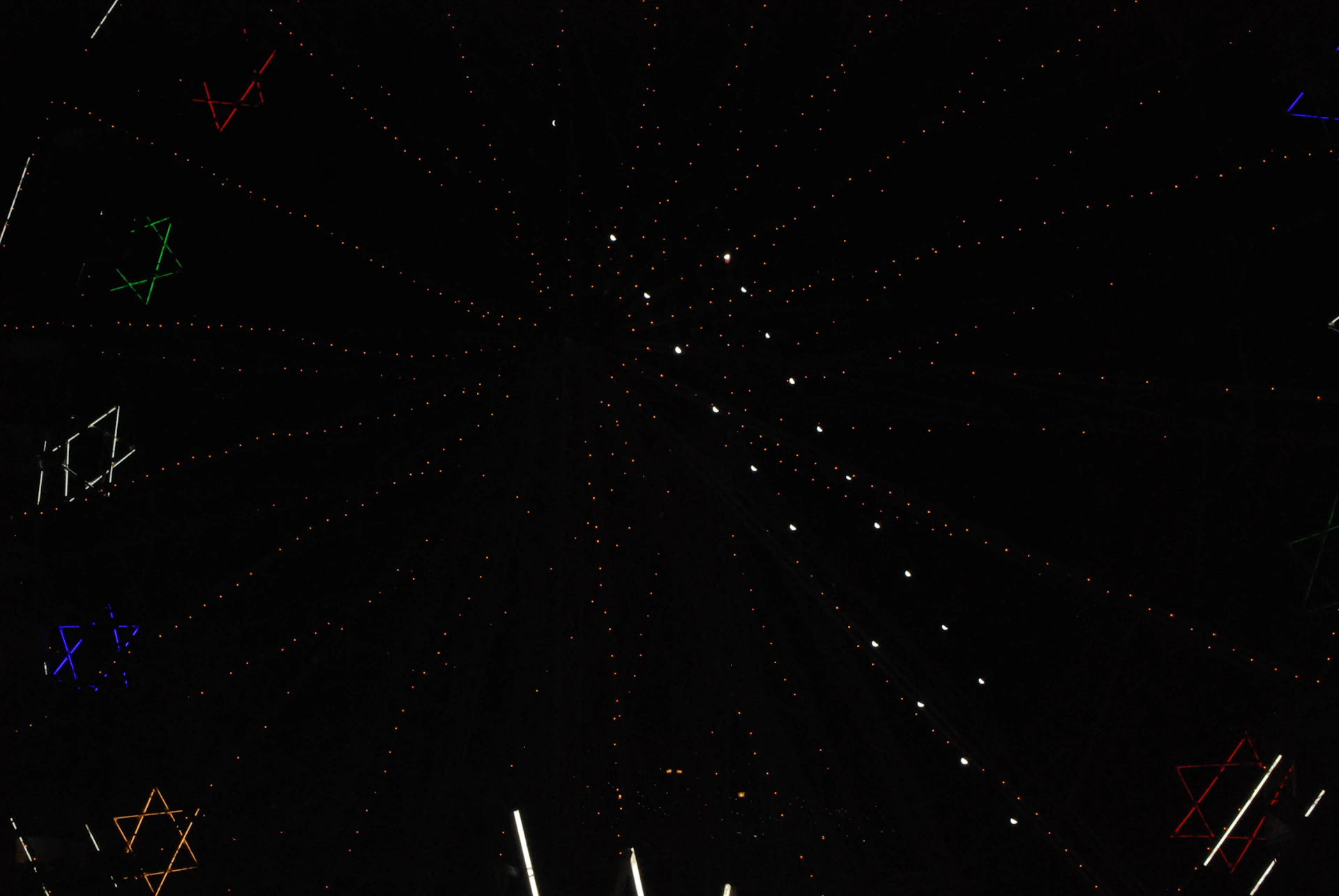 A starry space scene with a digital network grid overlay, symbolizing connectivity and innovation.